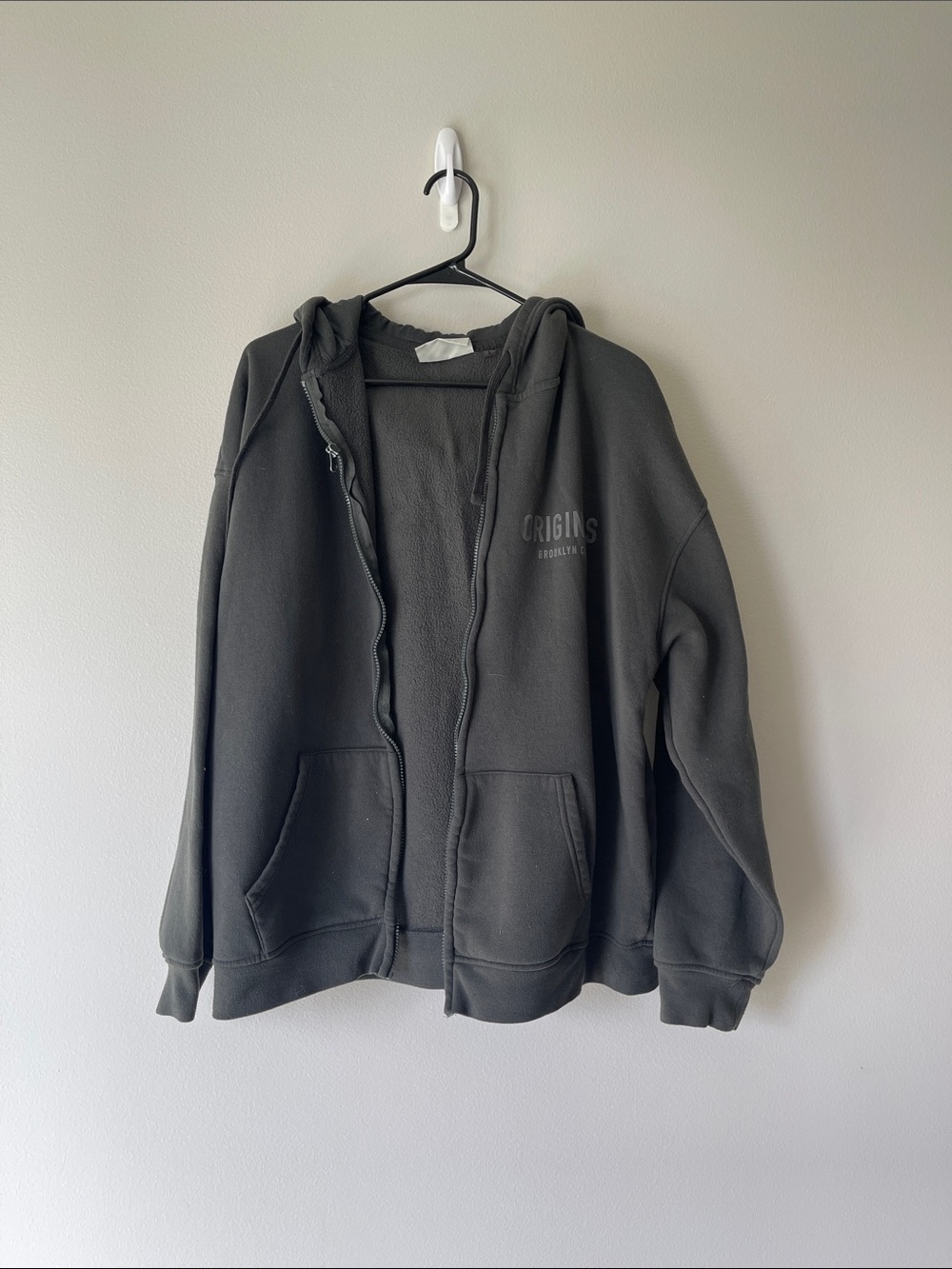 Origins Black Zip Hoodie with Subtle Logo